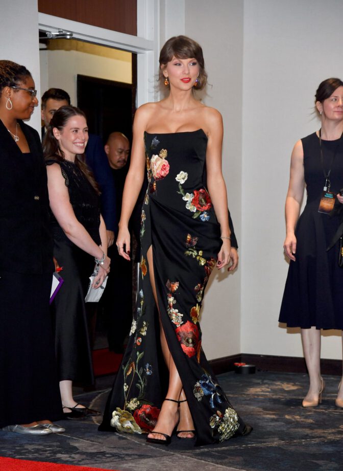 Taylor Swift Flaunts Busty Cleavage And Mile-High Legs In Sizzling Slit Gown At Awards Gala