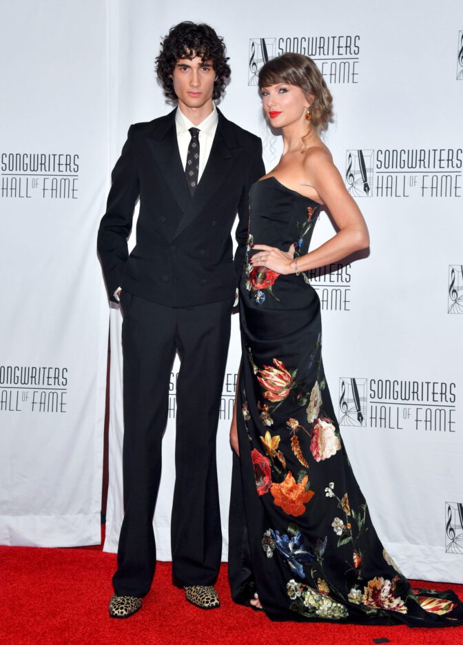 Taylor Swift Flaunts Busty Cleavage And Mile-High Legs In Sizzling Slit Gown At Awards Gala