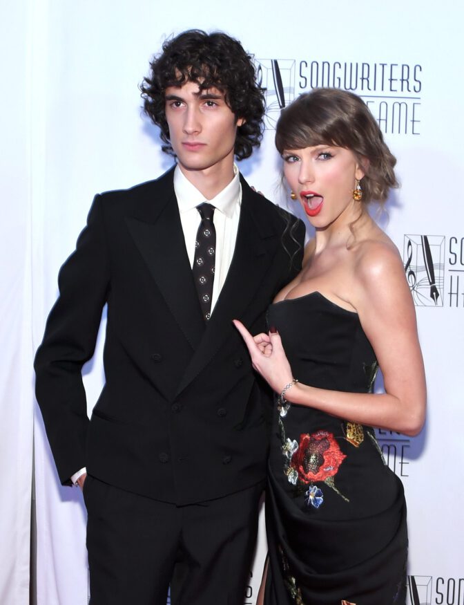 Taylor Swift Flaunts Busty Cleavage And Mile-High Legs In Sizzling Slit Gown At Awards Gala