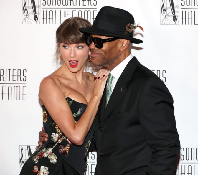 Taylor Swift Flaunts Busty Cleavage And Mile-High Legs In Sizzling Slit Gown At Awards Gala