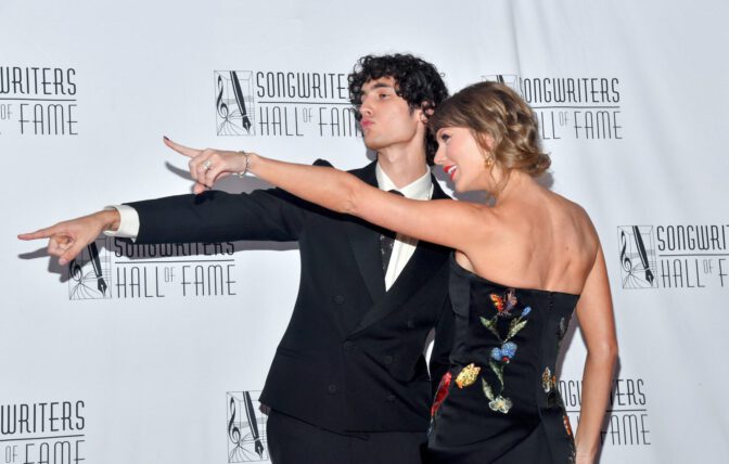 Taylor Swift Flaunts Busty Cleavage And Mile-High Legs In Sizzling Slit Gown At Awards Gala