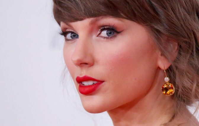 Taylor Swift Flaunts Busty Cleavage And Mile-High Legs In Sizzling Slit Gown At Awards Gala
