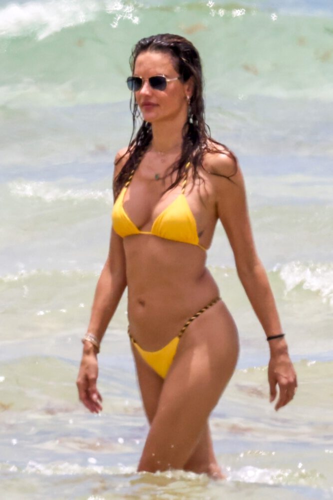 Alessandra Ambrosio Sizzles in Sultry Yellow G-String Bikini Exposing Her Voluptuous Boobs and Toned Ass on a Scorching Miami Beach Day