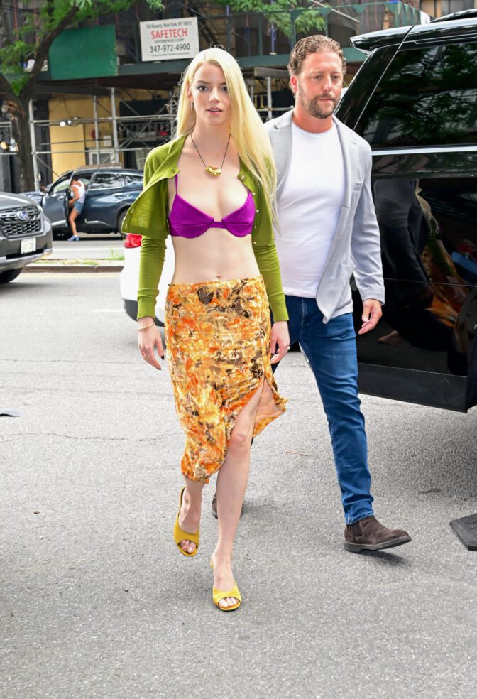Anya Taylor-Joy Sizzles in NYC with Naked Midriff and Bra-Baring Ensemble, Putting Her Sexy Blonde Boobs on Full Display