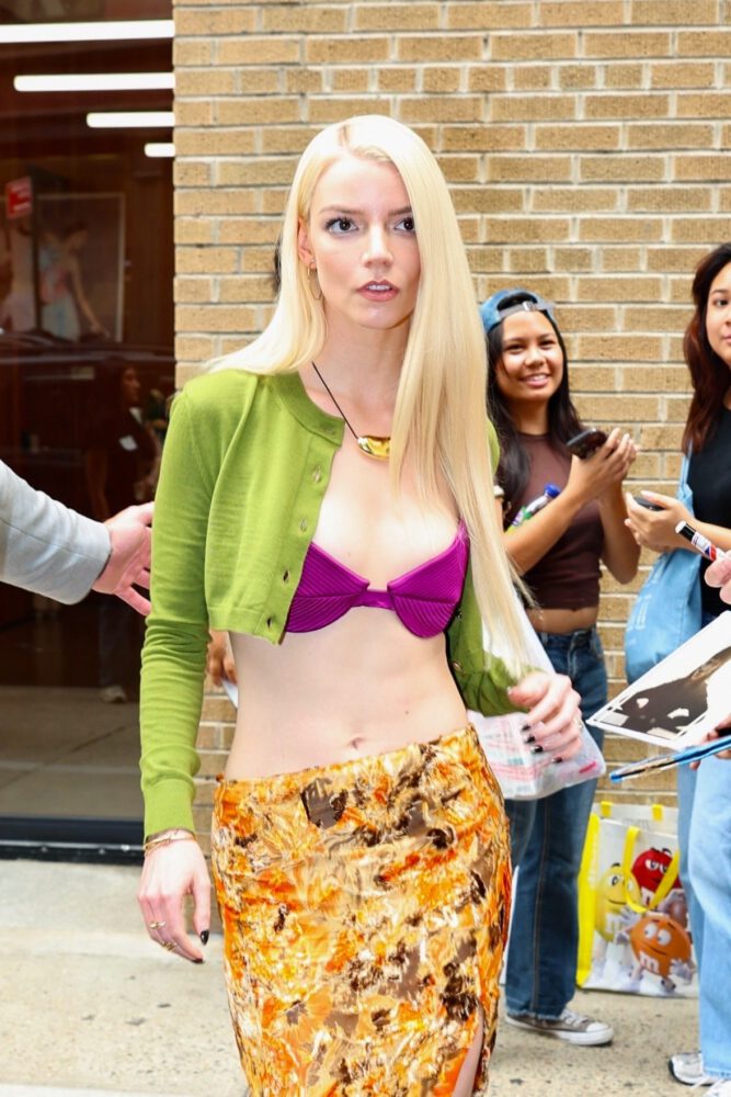 Anya Taylor-Joy Sizzles in NYC with Naked Midriff and Bra-Baring Ensemble, Putting Her Sexy Blonde Boobs on Full Display