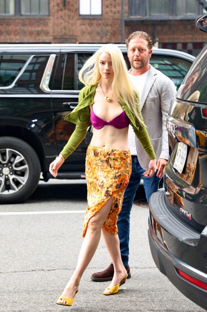 Anya Taylor-Joy Sizzles in NYC with Naked Midriff and Bra-Baring Ensemble, Putting Her Sexy Blonde Boobs on Full Display