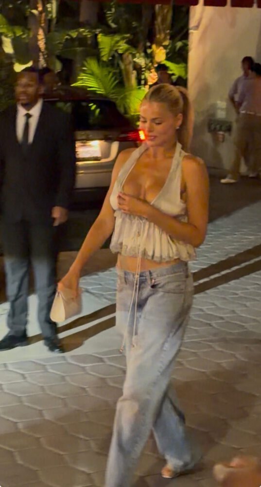 Brooks Nader Goes Completely Braless in Plunging Halter Top at Sunset Tower