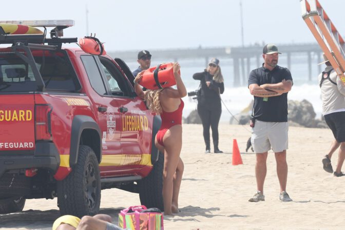 Brooks Nader Sizzles In Jaw-Dropping Red Swimsuit Exposing Her Voluptuous Boobs And Toned Ass On Baywatch Set