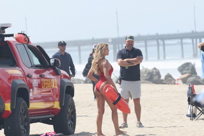 Brooks Nader Sizzles In Jaw-Dropping Red Swimsuit Exposing Her Voluptuous Boobs And Toned Ass On Baywatch Set