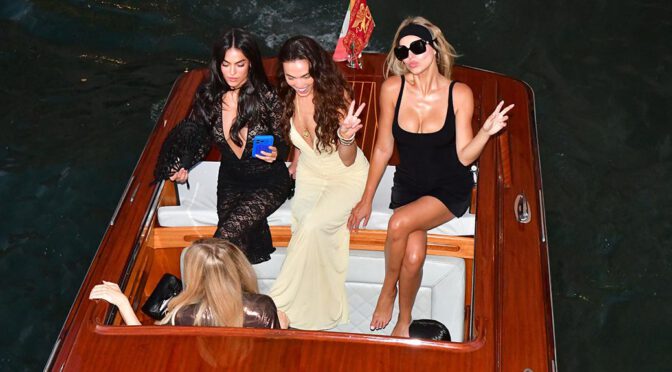 Brooks Nader Sizzles in Micro Minidress on Venice Yacht, Showcasing Jaw-Dropping Cleavage and Sultry Legs with Sisters