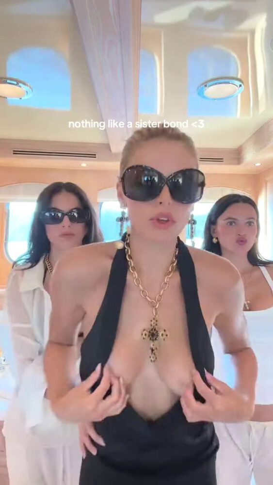 Brooks Nader Suffers Epic Boob Flash in Jaw-Dropping Black Gown While Dancing on Yacht with Sister Exposing Major Cleavage in Naughty NSFW Moment