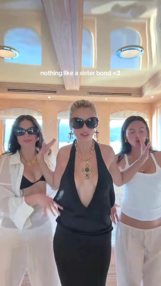 Brooks Nader Suffers Epic Boob Flash in Jaw-Dropping Black Gown While Dancing on Yacht with Sister Exposing Major Cleavage in Naughty NSFW Moment