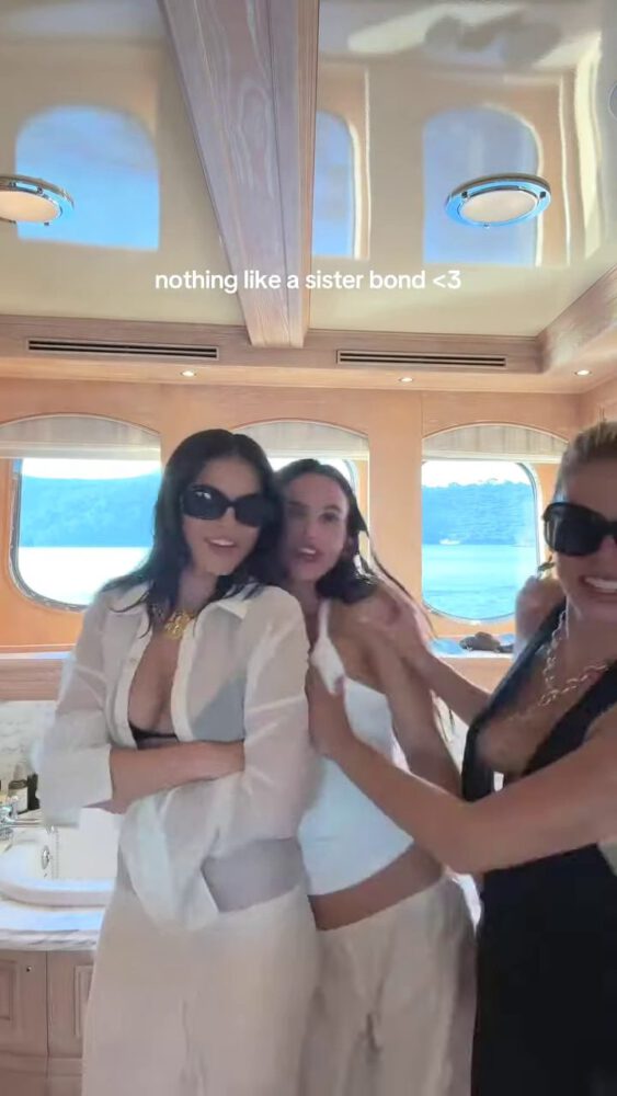 Brooks Nader Suffers Epic Boob Flash in Jaw-Dropping Black Gown While Dancing on Yacht with Sister Exposing Major Cleavage in Naughty NSFW Moment