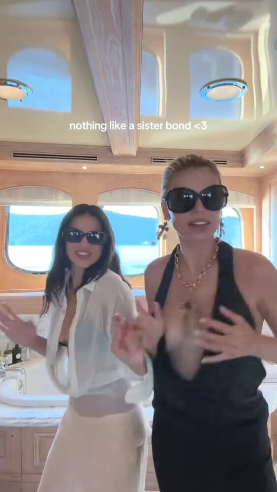 Brooks Nader Suffers Epic Boob Flash in Jaw-Dropping Black Gown While Dancing on Yacht with Sister Exposing Major Cleavage in Naughty NSFW Moment