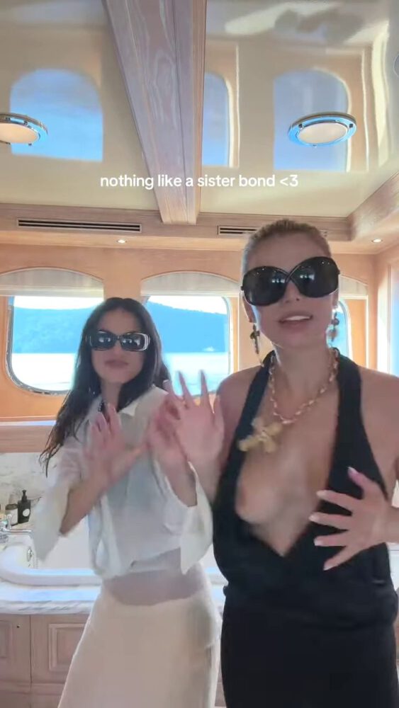 Brooks Nader Suffers Epic Boob Flash in Jaw-Dropping Black Gown While Dancing on Yacht with Sister Exposing Major Cleavage in Naughty NSFW Moment