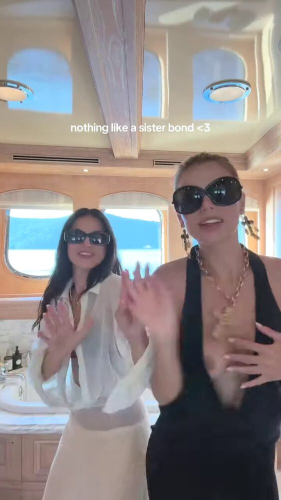 Brooks Nader Suffers Epic Boob Flash in Jaw-Dropping Black Gown While Dancing on Yacht with Sister Exposing Major Cleavage in Naughty NSFW Moment