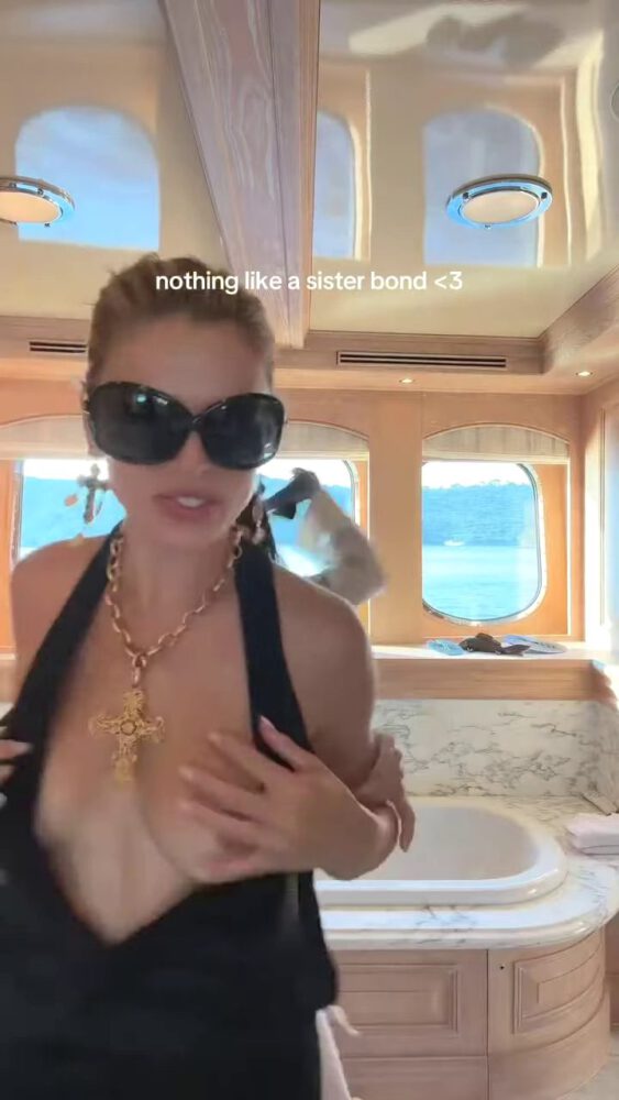 Brooks Nader Suffers Epic Boob Flash in Jaw-Dropping Black Gown While Dancing on Yacht with Sister Exposing Major Cleavage in Naughty NSFW Moment