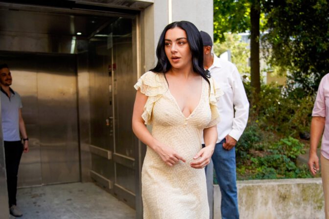 Charli XCX Sizzles in Paris with Jaw-Dropping Cleavage and Nipple Visibility in Daring Braless Appearance