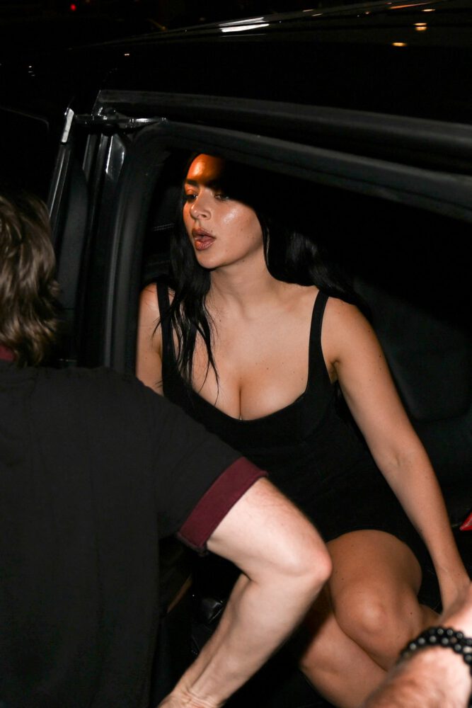 Charli XCX Sizzles in Skintight Parisian Getup with Jaw Dropping Cleavage Flash and Busty Boobs on Full Display