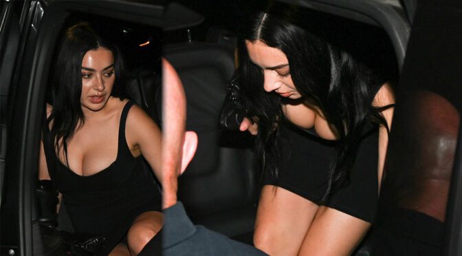 Charli XCX Sizzles in Skintight Parisian Getup with Jaw Dropping Cleavage Flash and Busty Boobs on Full Display