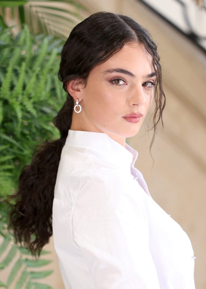 Deva Cassel Sizzles in Jaw-Dropping Cleavage-Baring White Shirt at Dior Couture Fashion Show