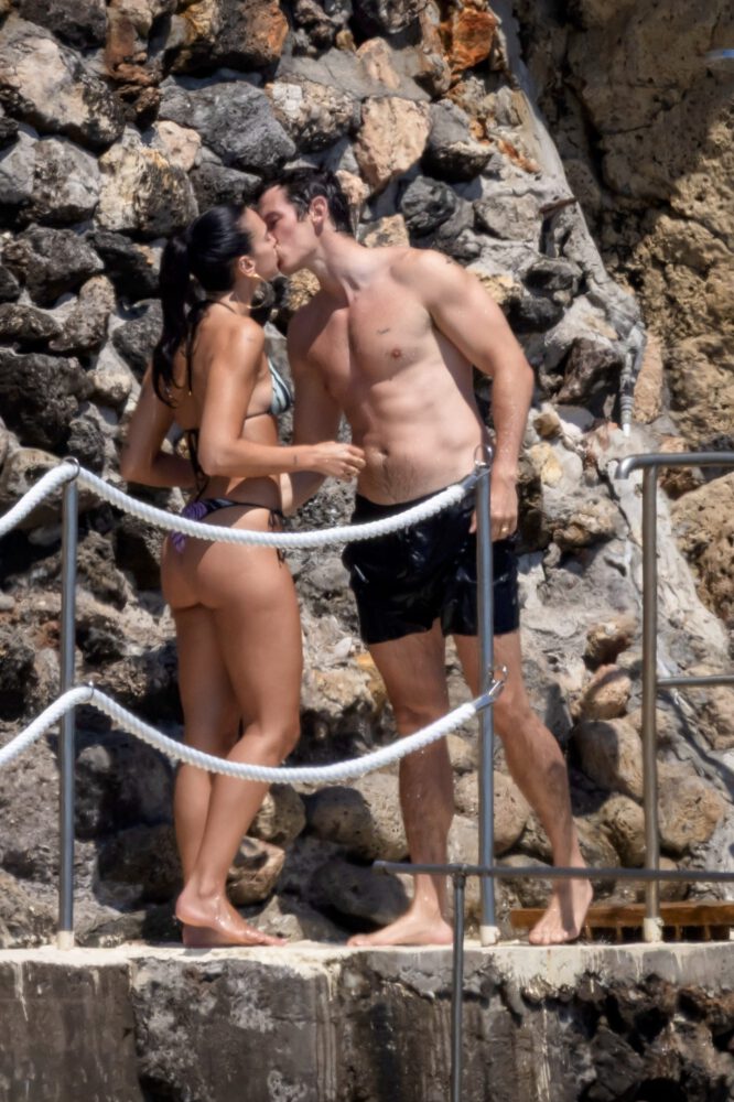 Dua Lipa Exposes Her Nude Tits and Bare Ass on a Rocky Beach with Callum Turner in a Sizzling Topless Display