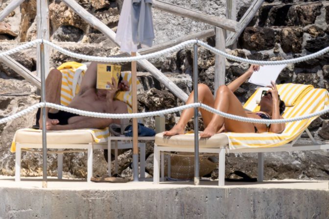 Dua Lipa Exposes Her Nude Tits and Bare Ass on a Rocky Beach with Callum Turner in a Sizzling Topless Display