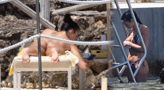 Dua Lipa Exposes Her Nude Tits and Bare Ass on a Rocky Beach with Callum Turner in a Sizzling Topless Display