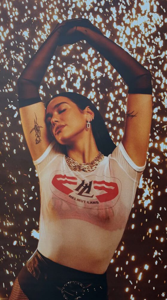 Dua Lipa Goes Totally Sheer in a Clinging Wet-Look Tee and Fishnets for Sexy New Photoshoot