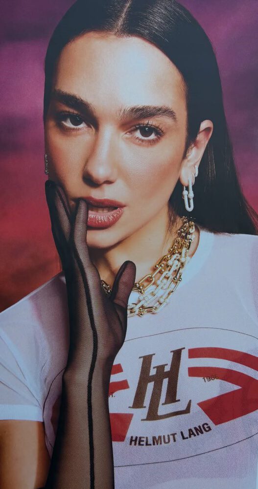 Dua Lipa Goes Totally Sheer in a Clinging Wet-Look Tee and Fishnets for Sexy New Photoshoot