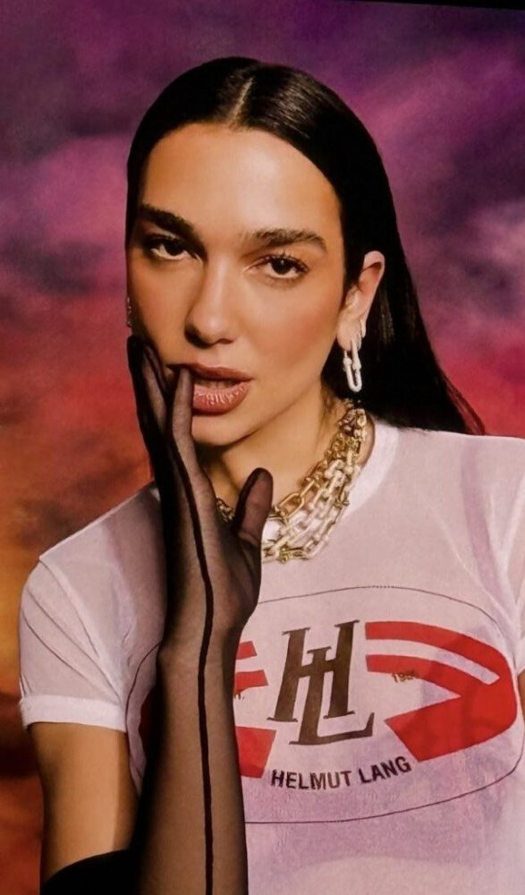 Dua Lipa Goes Totally Sheer in a Clinging Wet-Look Tee and Fishnets for Sexy New Photoshoot