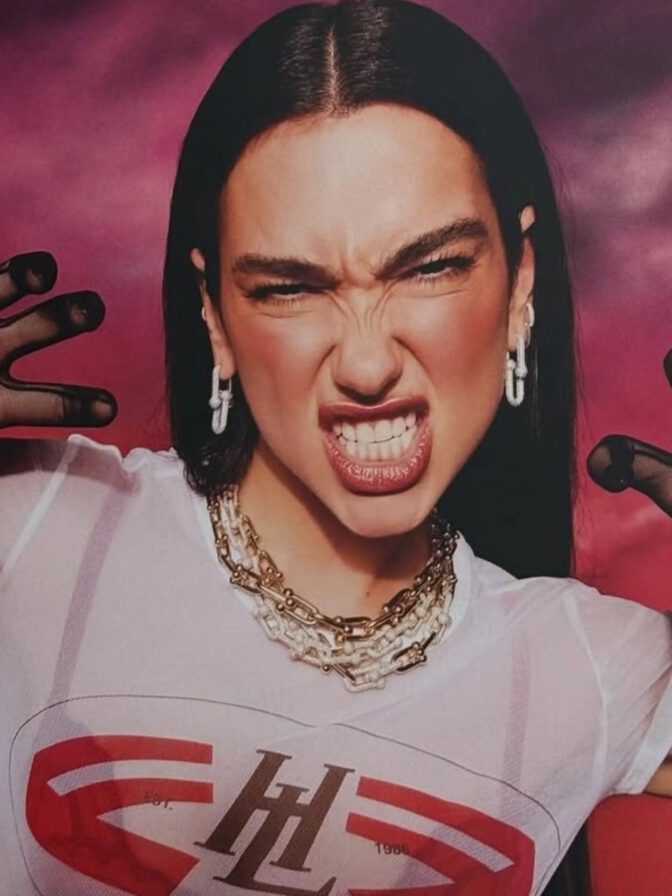 Dua Lipa Goes Totally Sheer in a Clinging Wet-Look Tee and Fishnets for Sexy New Photoshoot