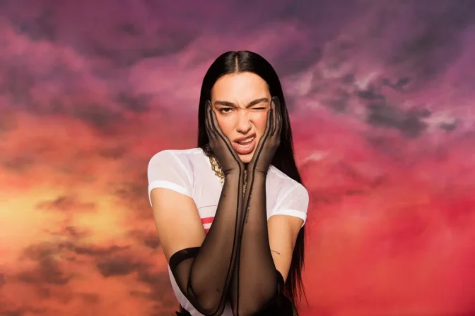 Dua Lipa Goes Totally Sheer in a Clinging Wet-Look Tee and Fishnets for Sexy New Photoshoot
