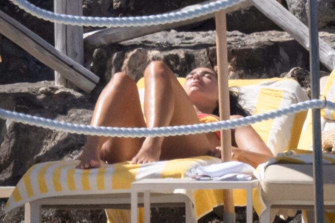 Dua Lipa Sizzles in Minuscule Yellow Bikini Exposing Her Curvy Ass During Sizzling Italian Vacation