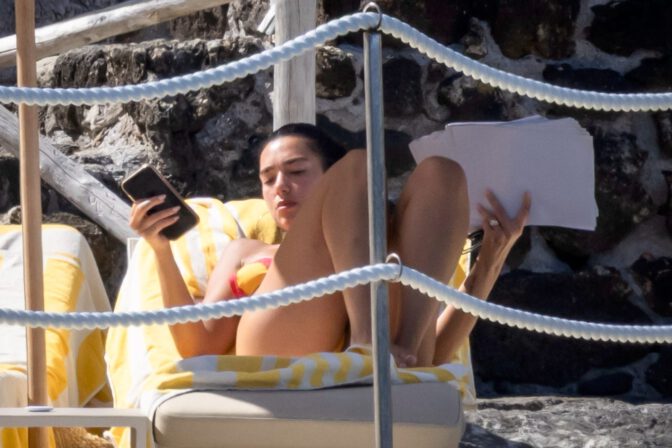 Dua Lipa Sizzles in Minuscule Yellow Bikini Exposing Her Curvy Ass During Sizzling Italian Vacation