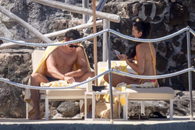 Dua Lipa Sizzles in Minuscule Yellow Bikini Exposing Her Curvy Ass During Sizzling Italian Vacation