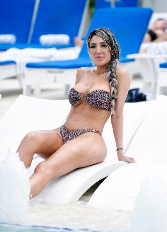 Farrah Abraham Sizzles in a Revealing Leopard Print Swimsuit, Showcasing Her Voluptuous Booty and Sultry Curves by the Pool in Texas