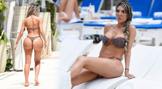 Farrah Abraham Sizzles in a Revealing Leopard Print Swimsuit, Showcasing Her Voluptuous Booty and Sultry Curves by the Pool in Texas