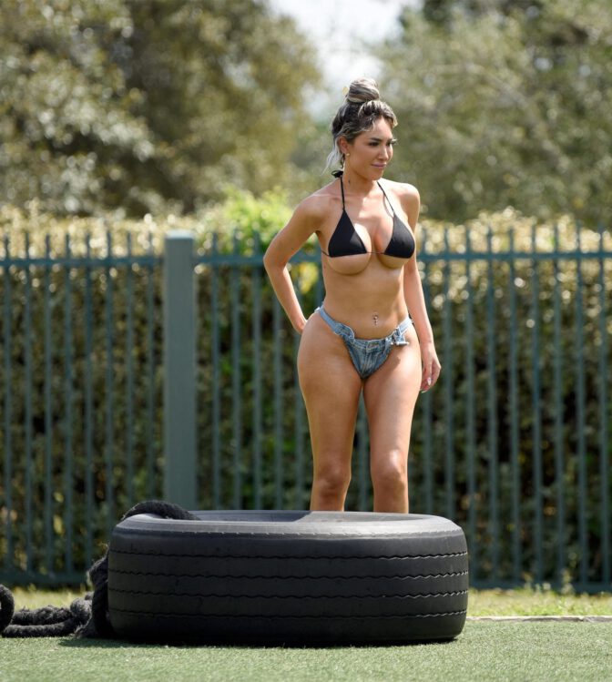 Farrah Abraham Sizzles in Skimpy Bikini and Shorts Exposing Her Voluptuous Boobs and Curvy Ass