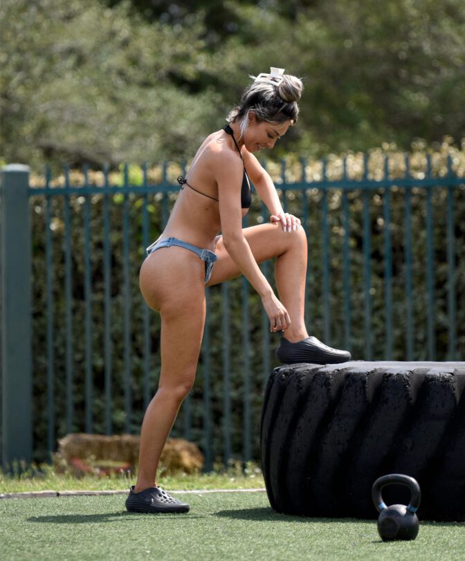 Farrah Abraham Sizzles in Skimpy Bikini and Shorts Exposing Her Voluptuous Boobs and Curvy Ass