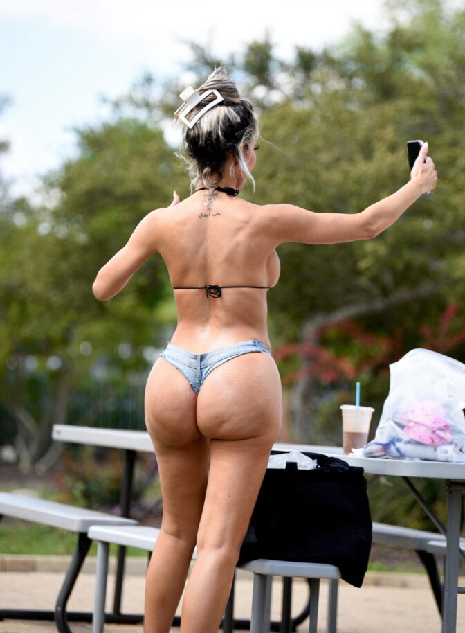 Farrah Abraham Sizzles in Skimpy Bikini and Shorts Exposing Her Voluptuous Boobs and Curvy Ass