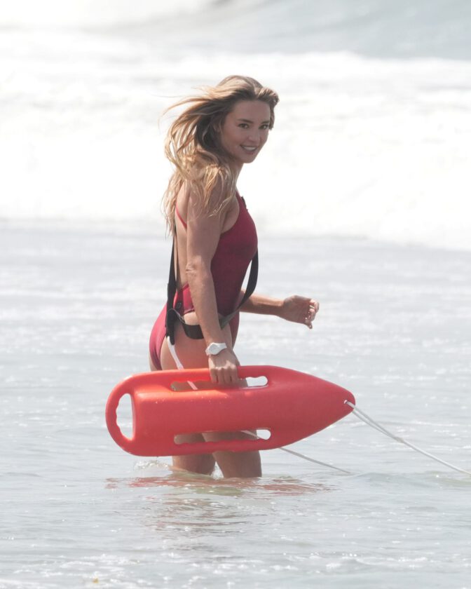 Hassie Harrison Sizzles in Drenched Baywatch Swimsuit Exposing Voluptuous Boobs and Sultry Booty