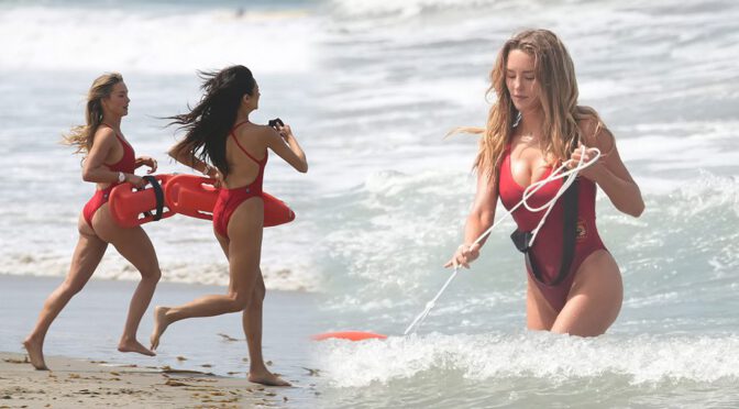Hassie Harrison Sizzles in Drenched Baywatch Swimsuit Exposing Voluptuous Boobs and Sultry Booty