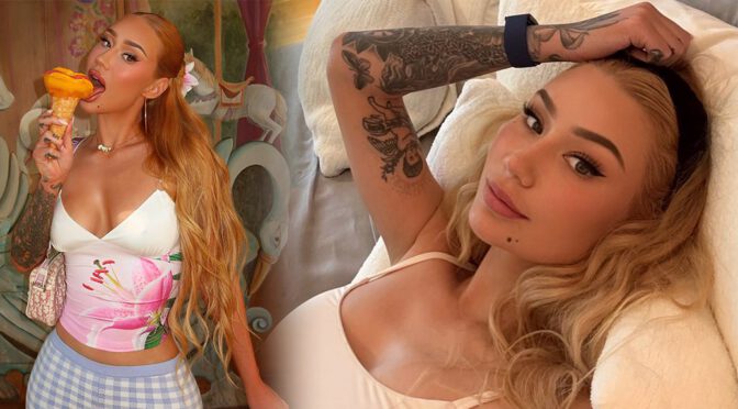 Iggy Azalea Sizzles in Jaw-Dropping Carousel Photoshoot Exposing Major Cleavage in Minuscule Floral Top While Seductively Licking Ice Cream