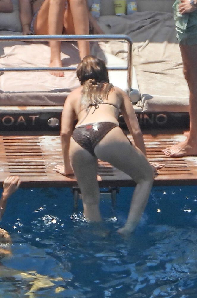 Lily James Flaunts Jaw-Dropping Curves in Barely-There Bikini on Portofino Boat