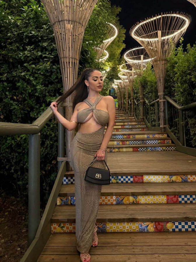Maddalena Cabizzosu Sizzles in Skintight Dress with Jaw-Dropping Underboob Exposure and Serious Cleavage Action
