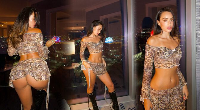 Sommer Ray Sizzles in Sultry Hotel Photoshoot with Cheeky Micro Animal Print Skirt that Leaves Little to Imagination and Bares Her Voluptuous Ass