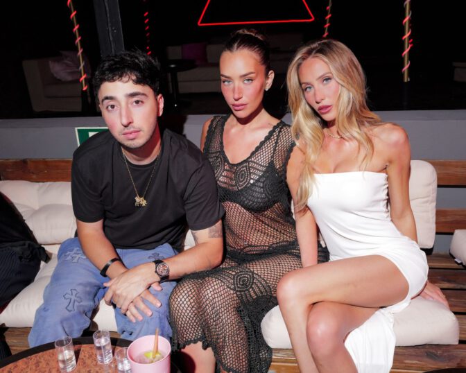 Anastasia Karanikolaou and Alix Earle Set Ibiza Ablaze in Sexy Sheer Crochet and Tiny White Mini Dress, Flaunting Their Boobs and Cleavage