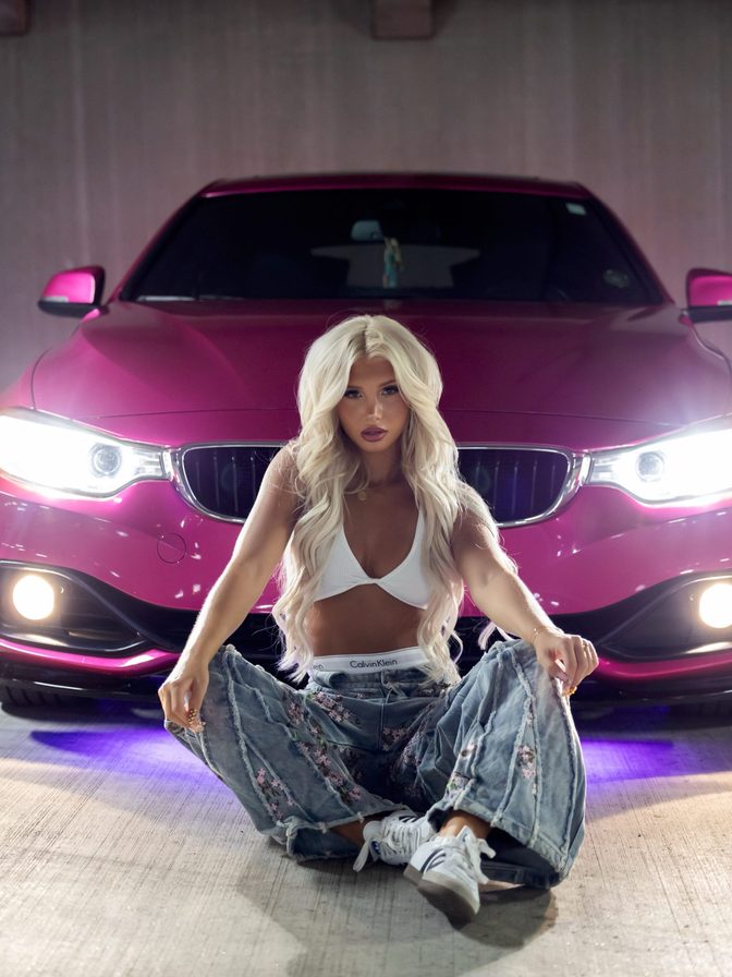 Brooklyn Riley Flaunts Sexy Tits in a White Crop Top, Patchwork Denim and Pink BMW