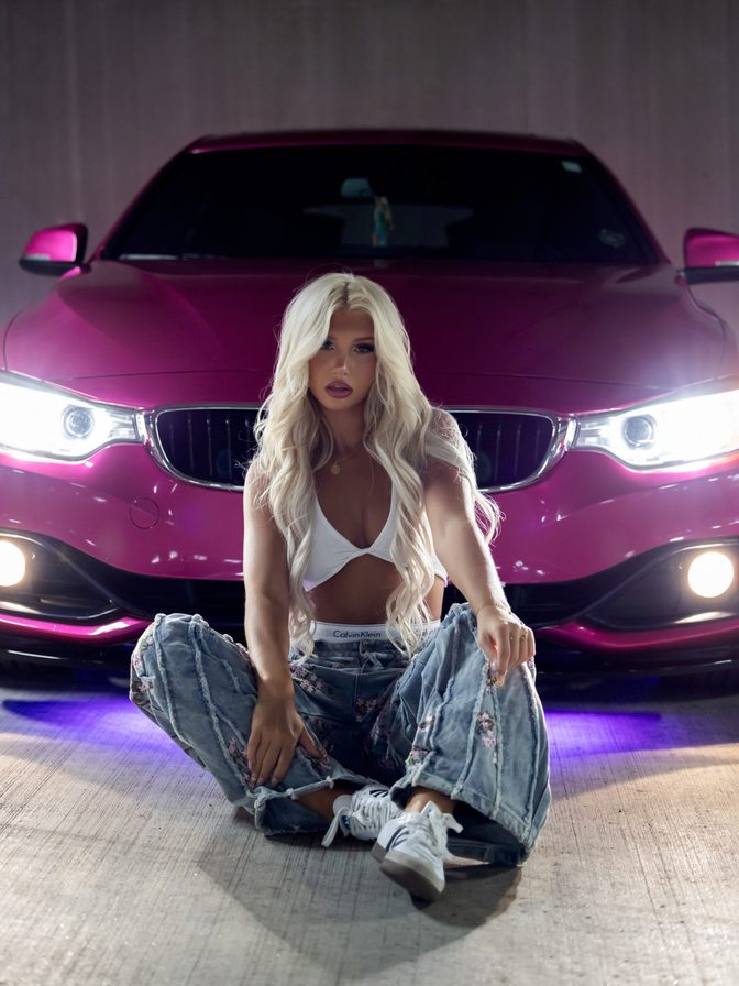 Brooklyn Riley Flaunts Sexy Tits in a White Crop Top, Patchwork Denim and Pink BMW